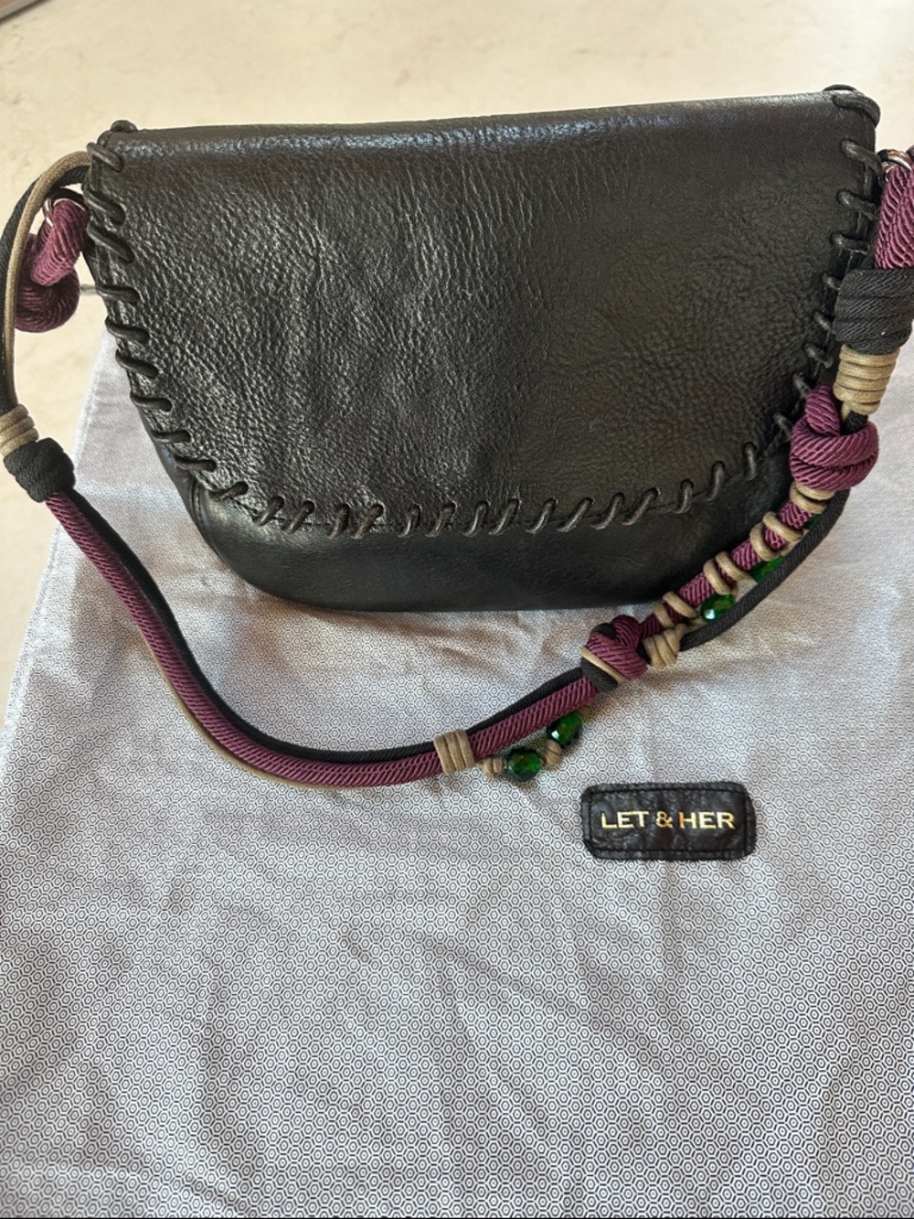 Black Leather Crossbody Bag with Purple Accent Strap